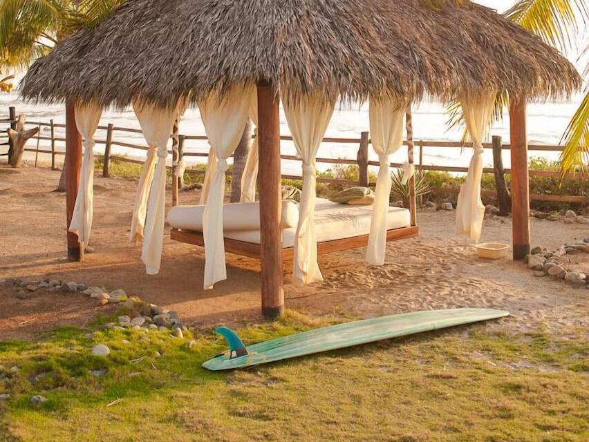 Beach palapa daybed, surf out front
