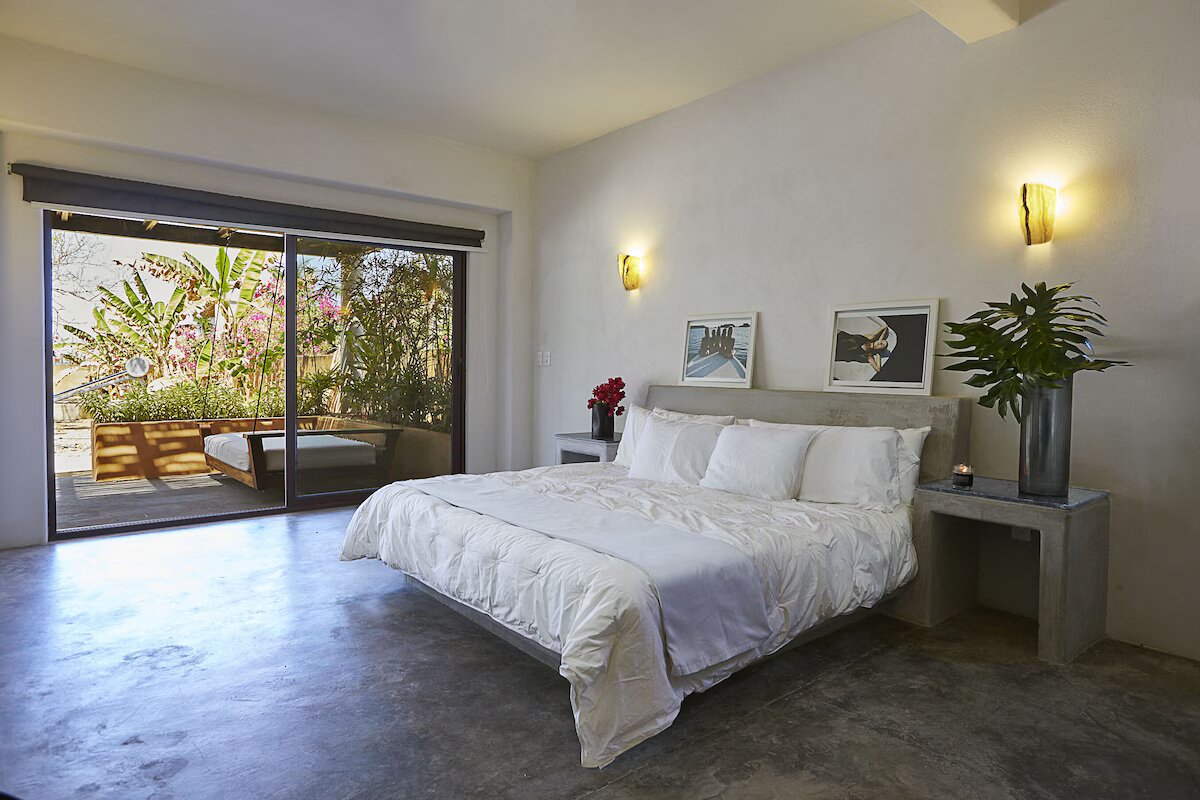 The bedrooms open to the garden